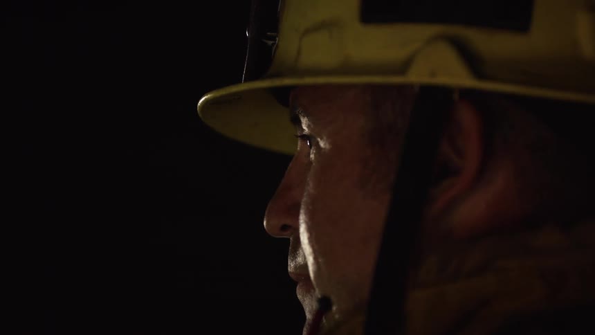 Close up of a firefighter smiling