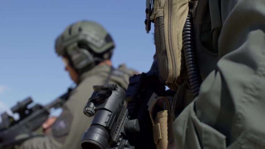 Police officers in military uniform on a trainin exercise