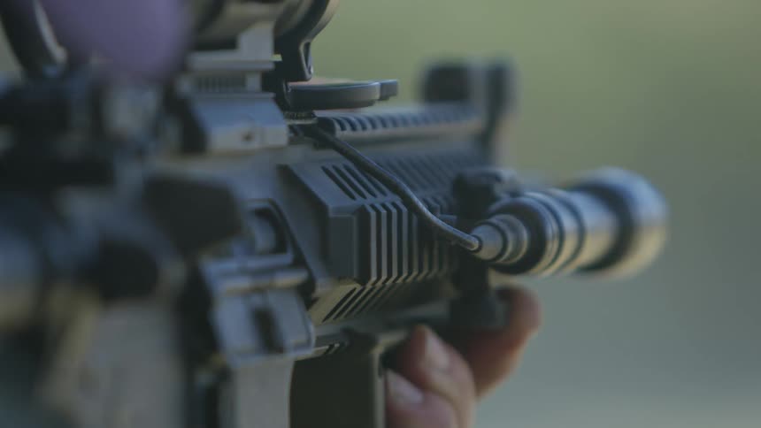 Shots being fired from a gun