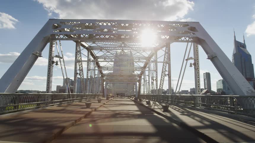 An empty highway is displayed in a downtown city