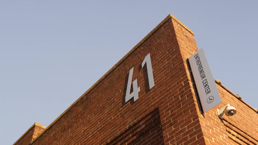 A building is displayed in a city