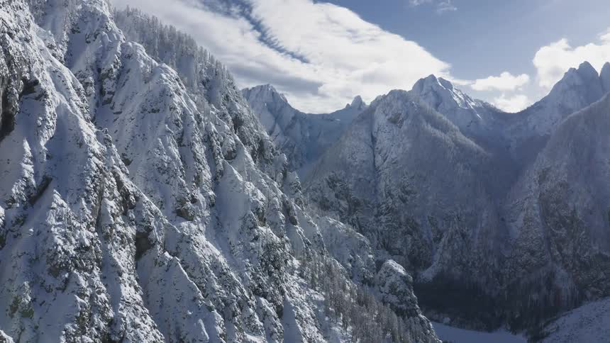 Aerial view of a snow covered mountain range
