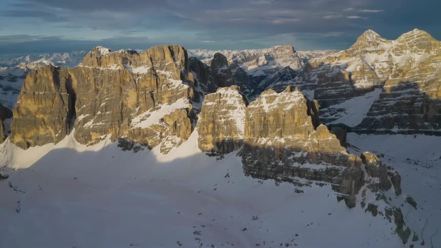 Aerial view of snow covered mountains