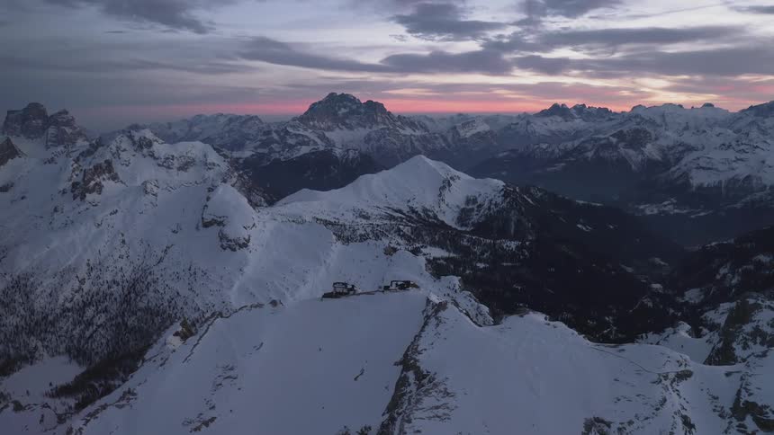 Aerial view of snow covered mountains