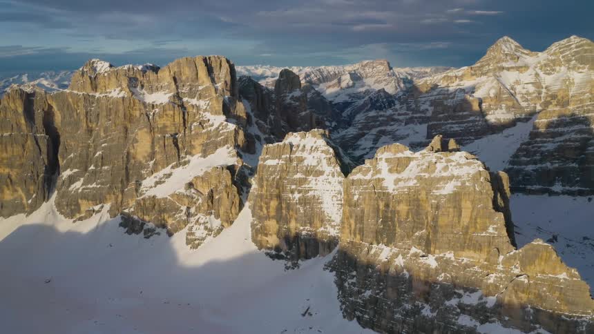 Aerial view of snow covered mountains