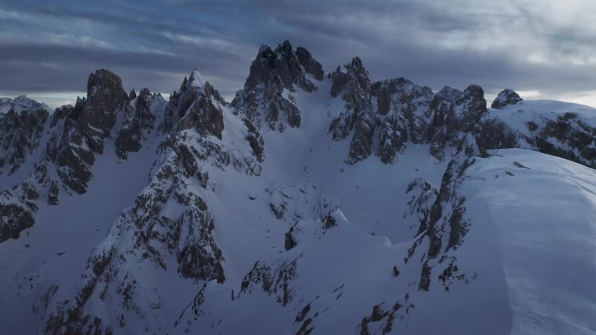 Aerial view of a snow covered mountain range