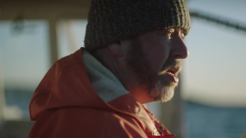 A man looks worried on the boat