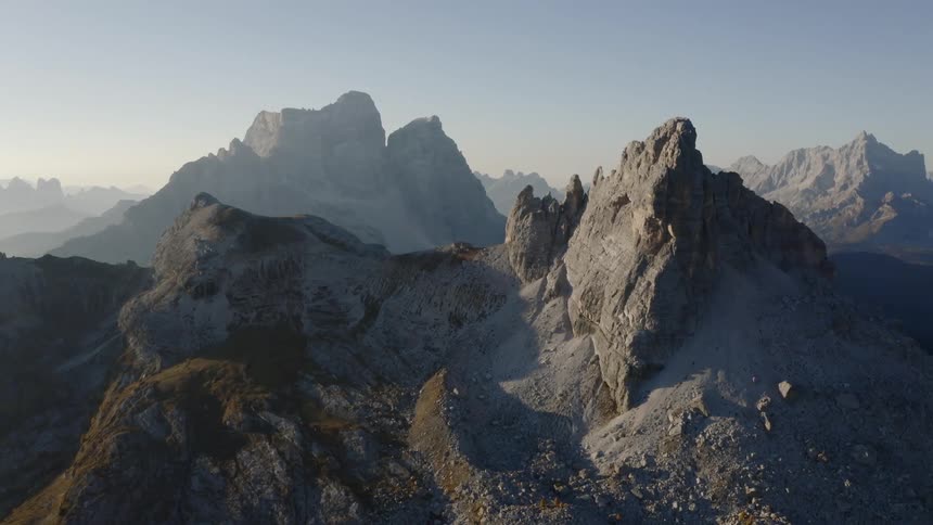 Jagged and rocky mountain ridge and peaks on a hazy day