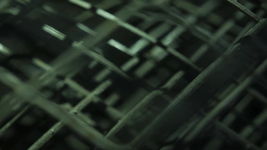 Light and shadows that look like a cage in motion in a vehicle