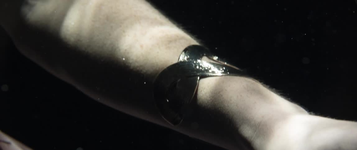 A person is floating around in the water