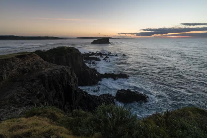Timelapse of a shoreline during sunrise
