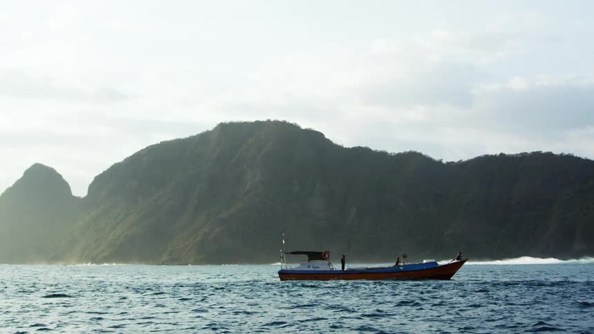 People relaxing on a boat in the water
