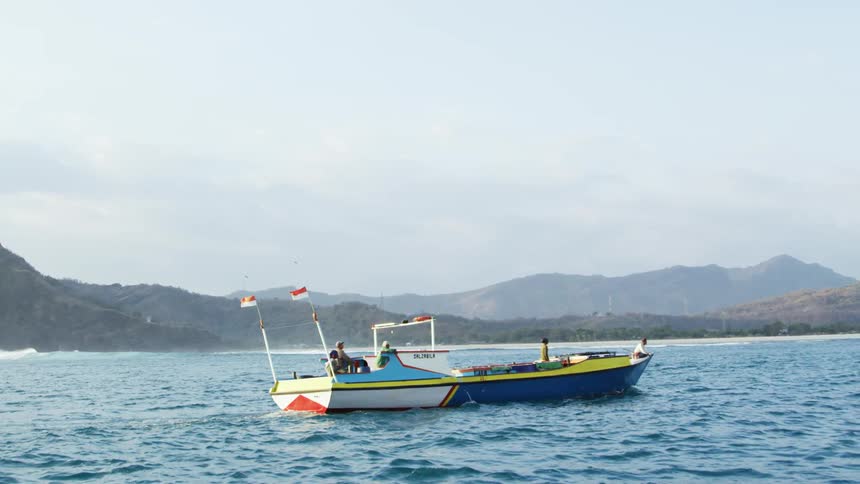 People relaxing on a boat in the water
