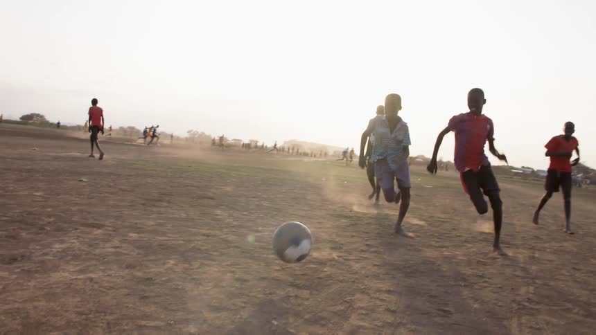 Children are playing a game of soccer