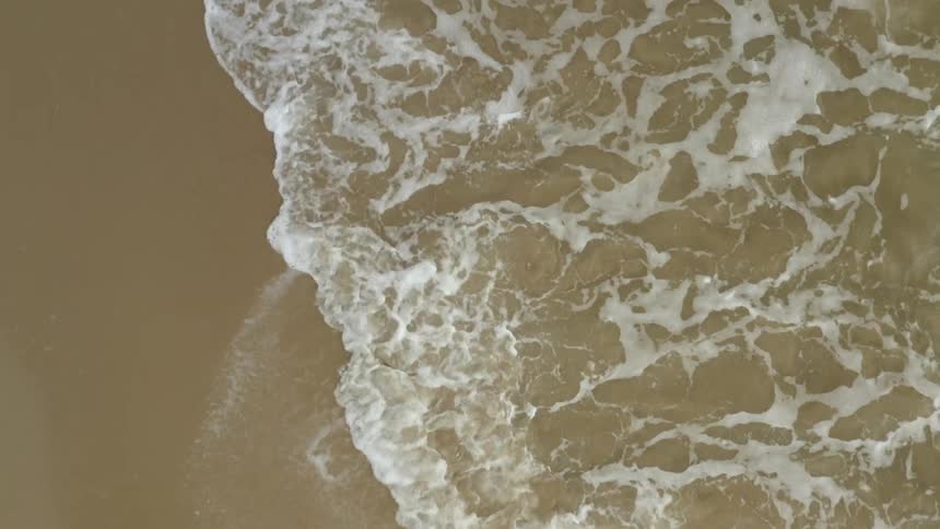 Waves rolling on to the beach