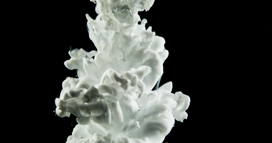 A white fluid expands when poured into a solution