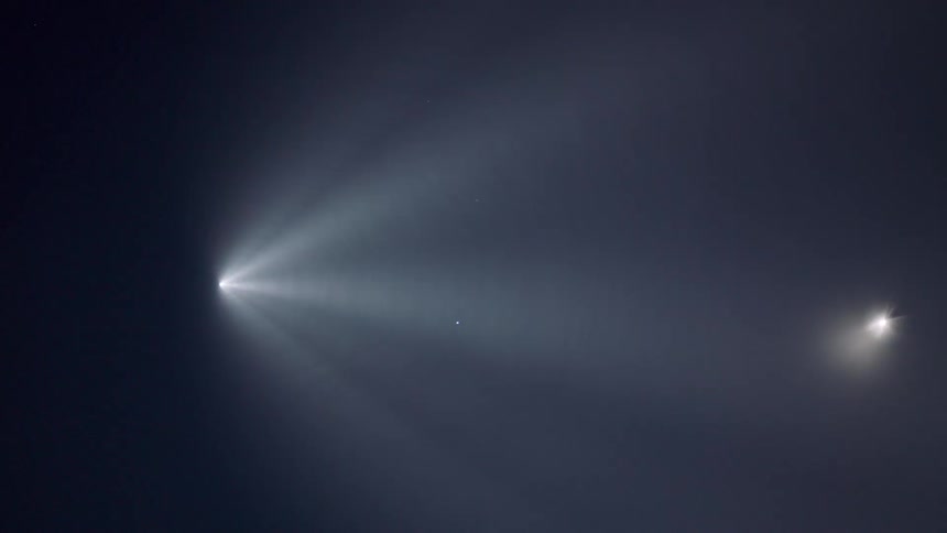 Spotlights cast rays into dark room