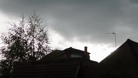 A house in a neighborhood on a cloudy day