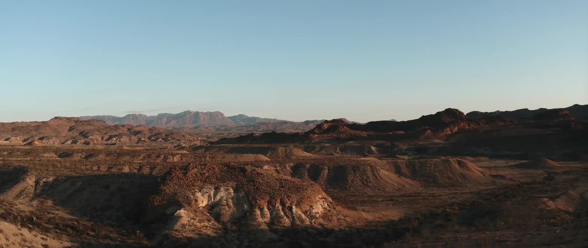 Hills and mountains fill in a desert area