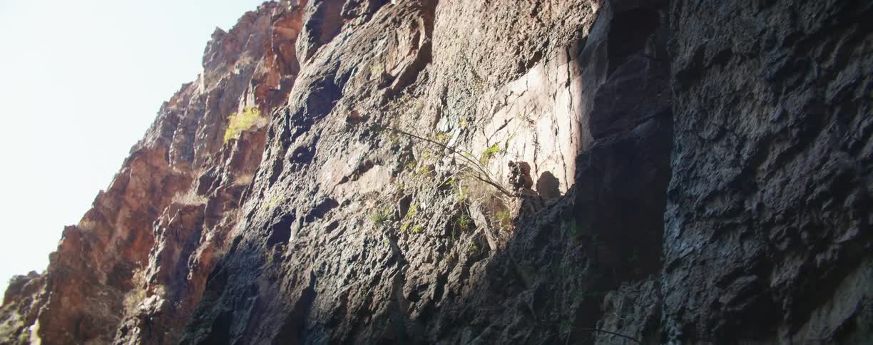 Anaerial view of a mountain is displayed