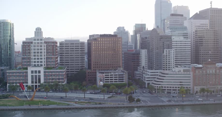 An aerial view of a downtown city is displayed