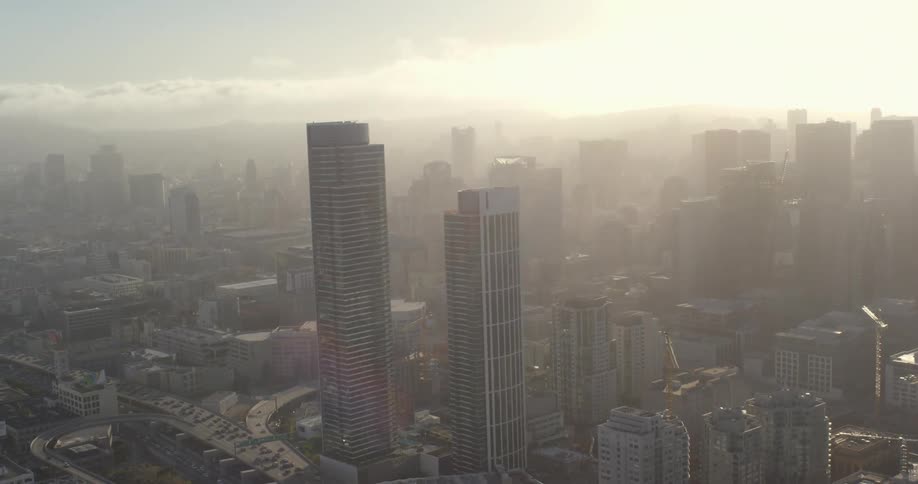 Fog covers the city in the morning