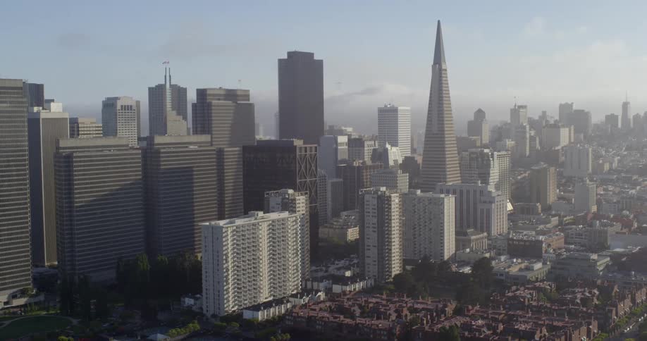 An aerial view of the downtown region of a large city with its many skyscrapers