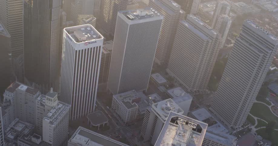 High rise buildings and skyscrapers rise up in a downtown area