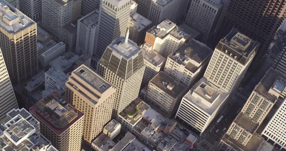 A city with buildings skyscrapers streets and vehicles
