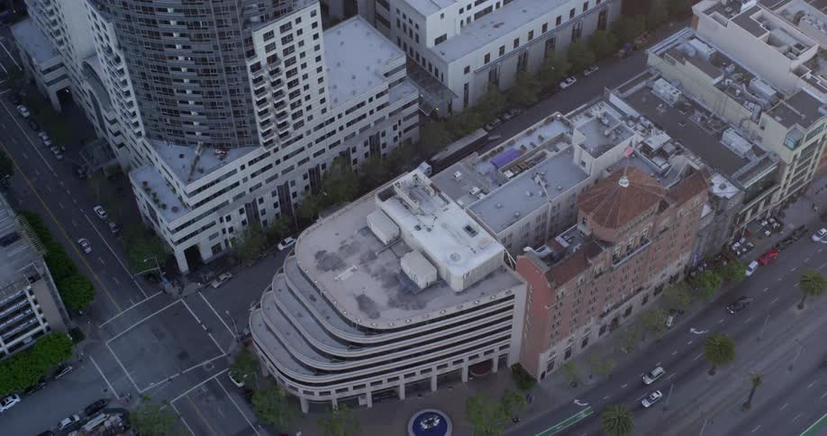 An aerial view of a downtown city is displayed