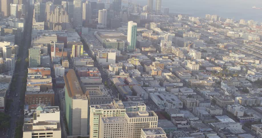 Neighborhoods stretch out near a dense downtown area