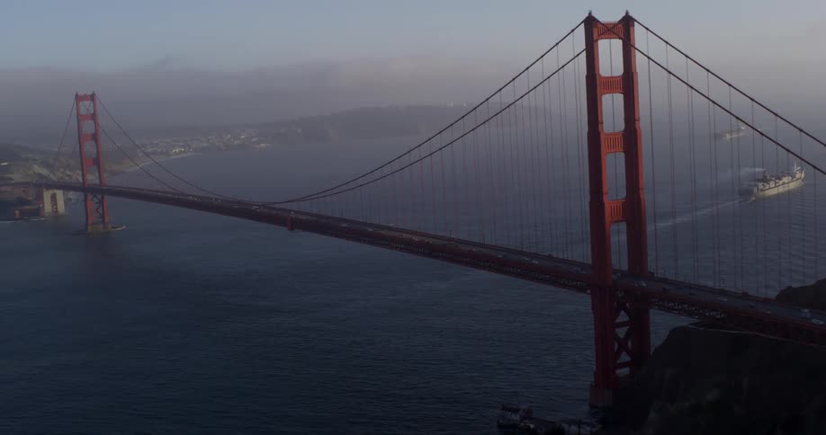The bridge is full of cars traveling to the city