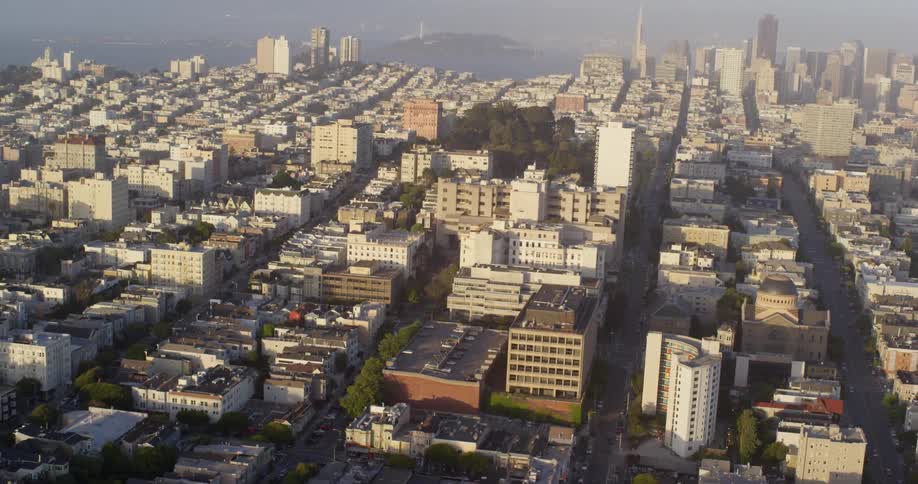 An aerail view of a downtown city is displayed