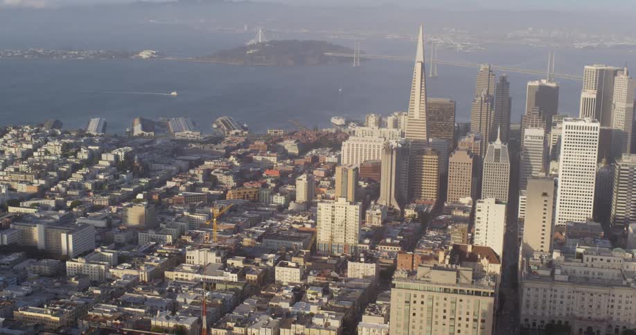 Aerial view of buildings in a downtown area off the water