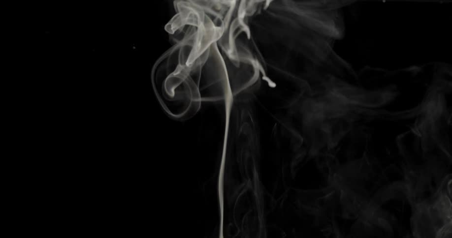 A flame is blown out and smoke rises