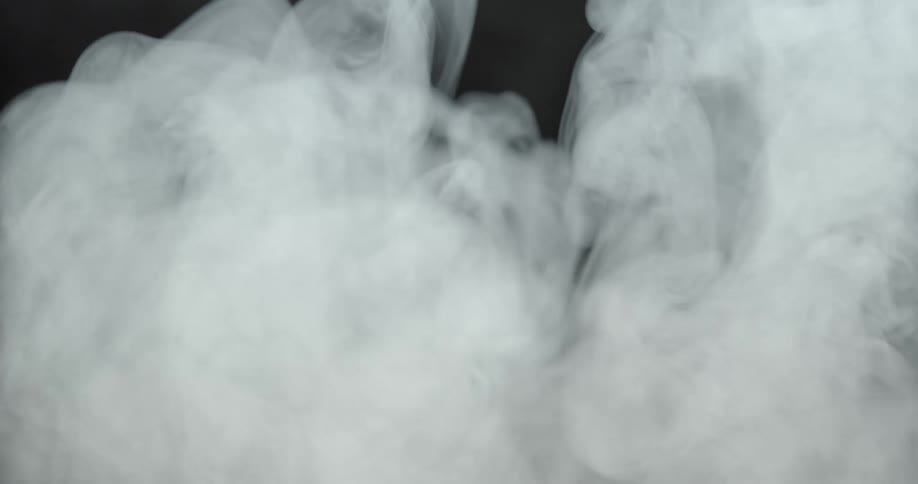 A thick cloud of smoke billows in the air
