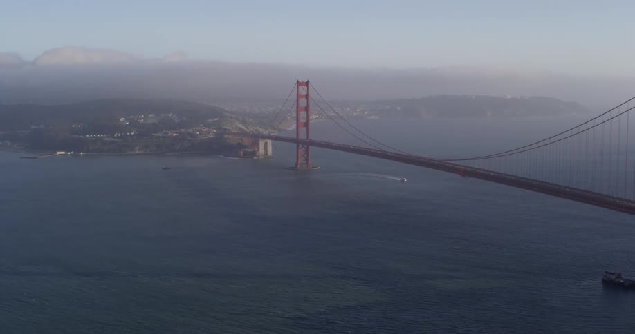 The golden gate bridge stretches across a bay