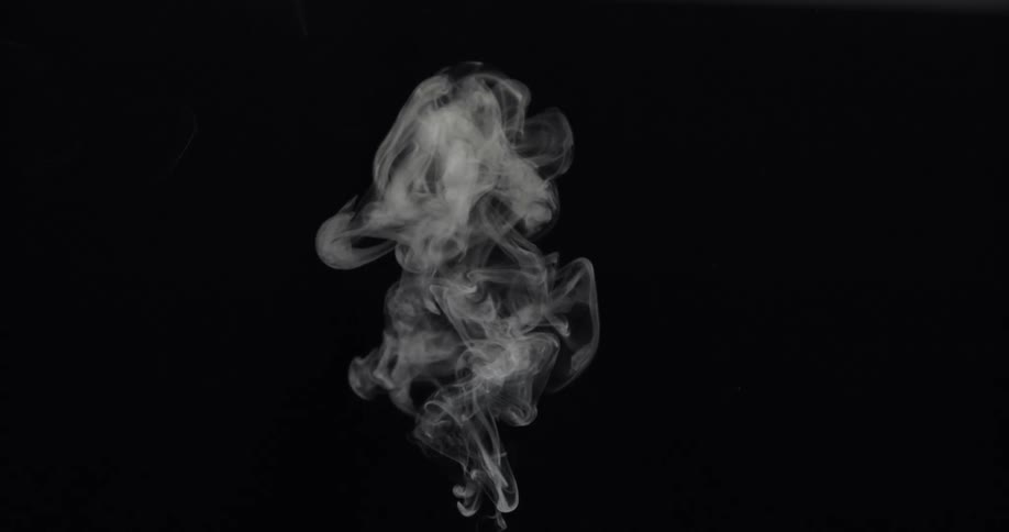 A puff of smoke billows in to the air