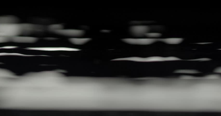 The lines swirl and move in a line