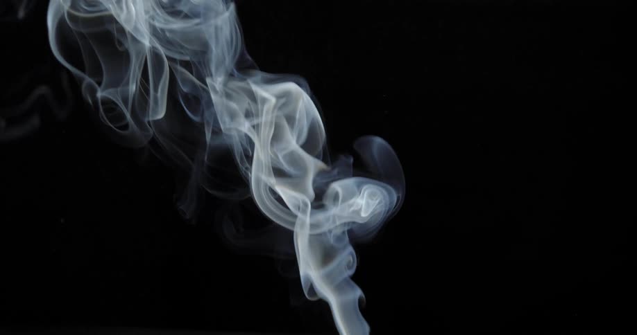 An extinguished match gives off smoke