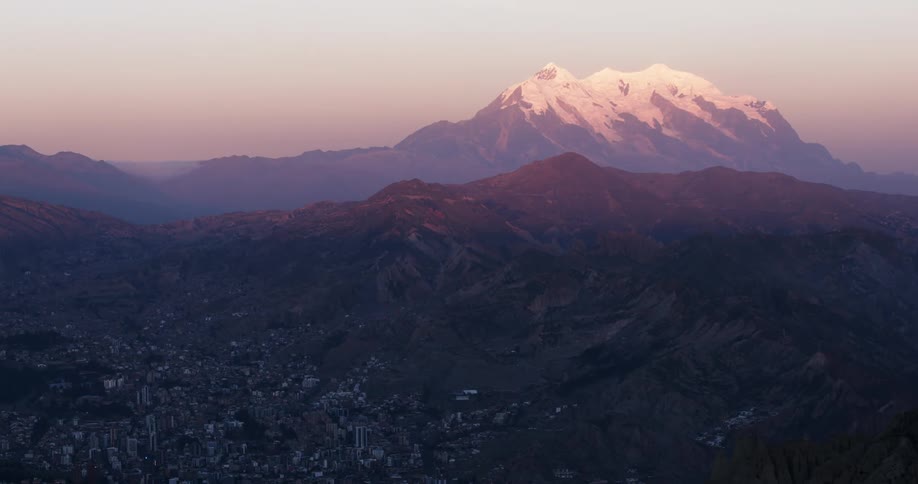 A city fills a mountain valley