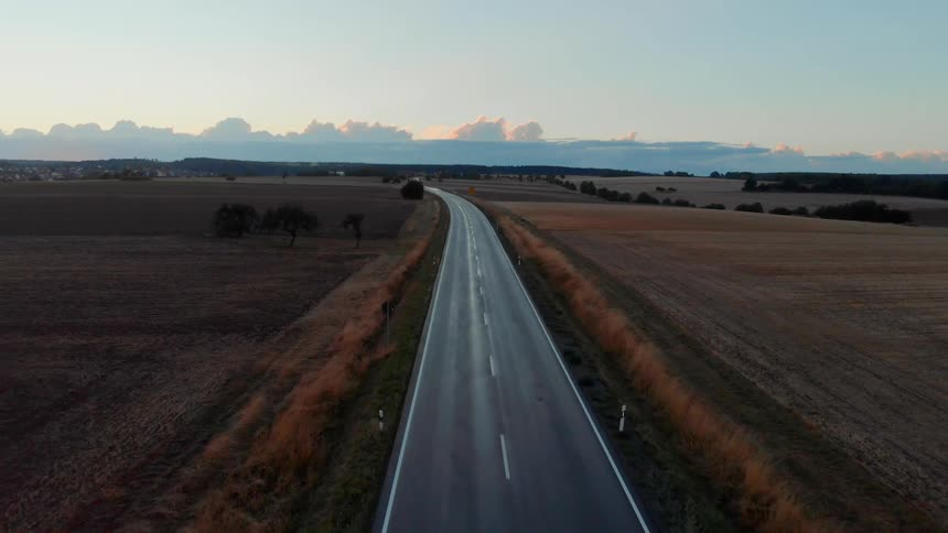 Aerial view of a highway stretching across plains