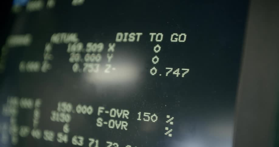 White digits change on a black display board