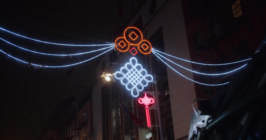 The lights hang across the street