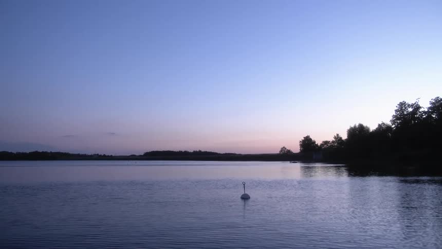 Landscape view of the a buoy on a lake