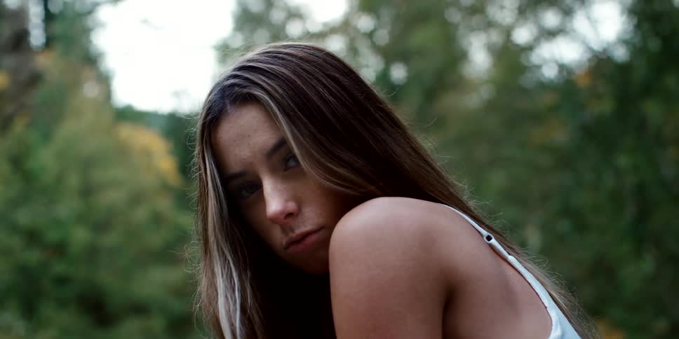 A teenager poses for a photo