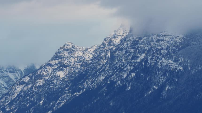 Clouds covering a mountain range