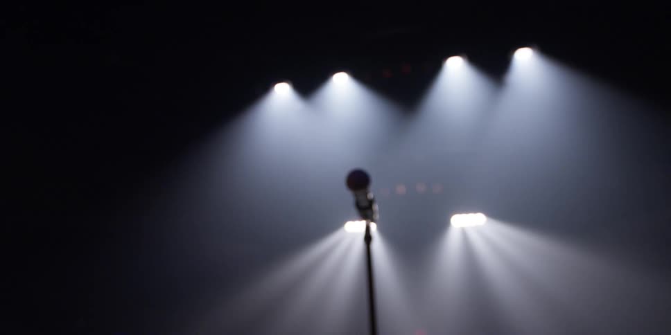 The empty stage is covered with lights