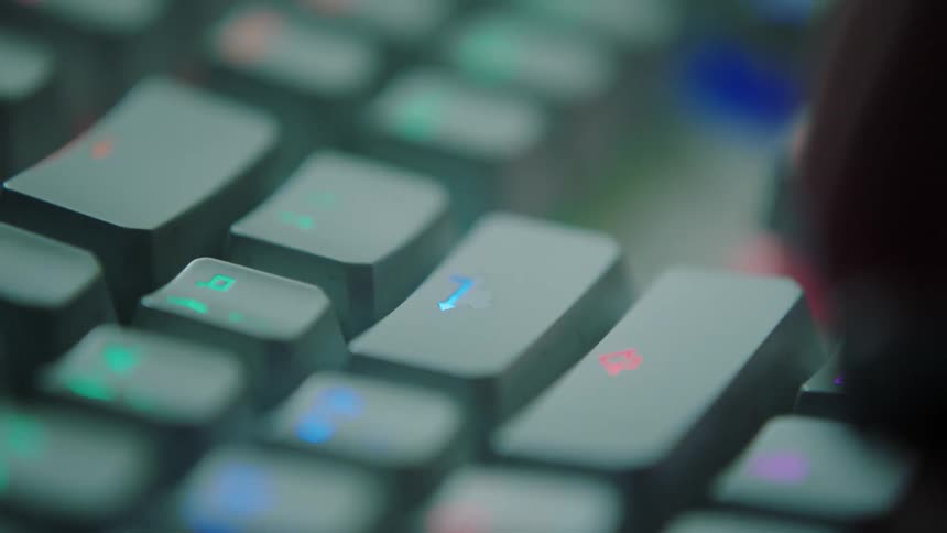 A person is typing on a computer