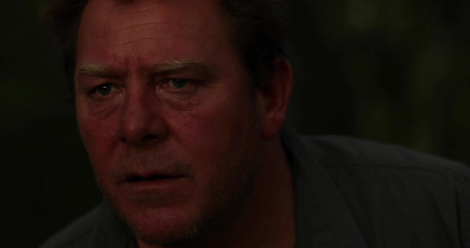 Man stares straight ahead then moves forward
